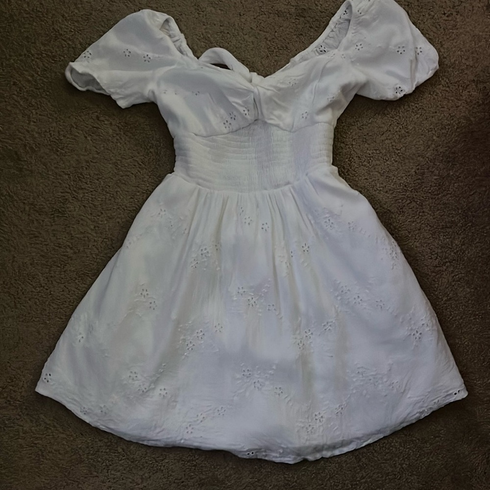 This is a white short puff dress